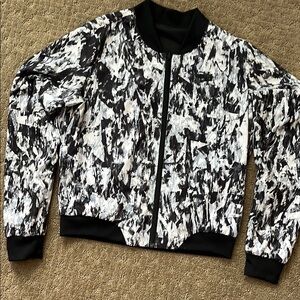 Nike Black and White Reversible Bomber Jacket with Abstract Design